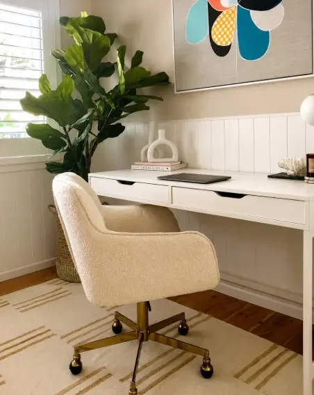 Warm neutral study with  and natural light in Forestville home.
