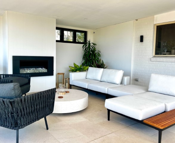 undercover outdoor alfresco space with fireplace