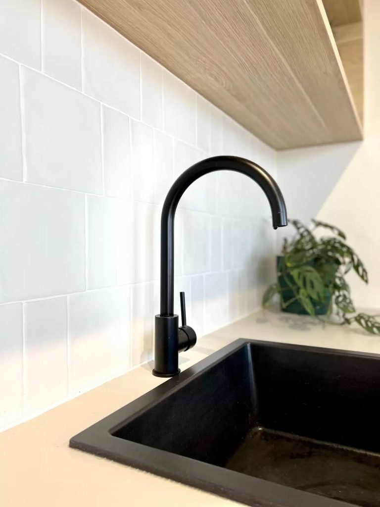Matte black sink and tapware