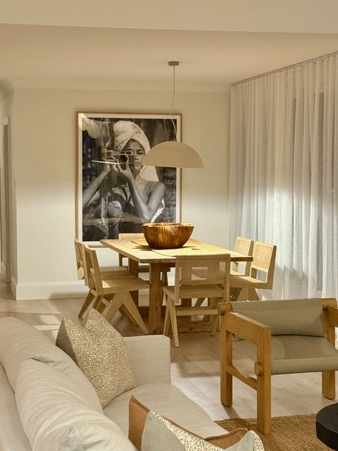 A beautifully styled costal dining area in a Collaroy full home renovation.