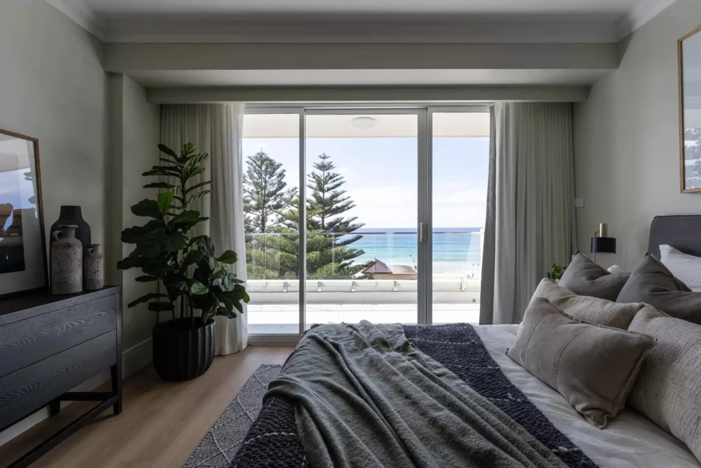 Beach front apartment bedroom after a full renovation in Manly NSW